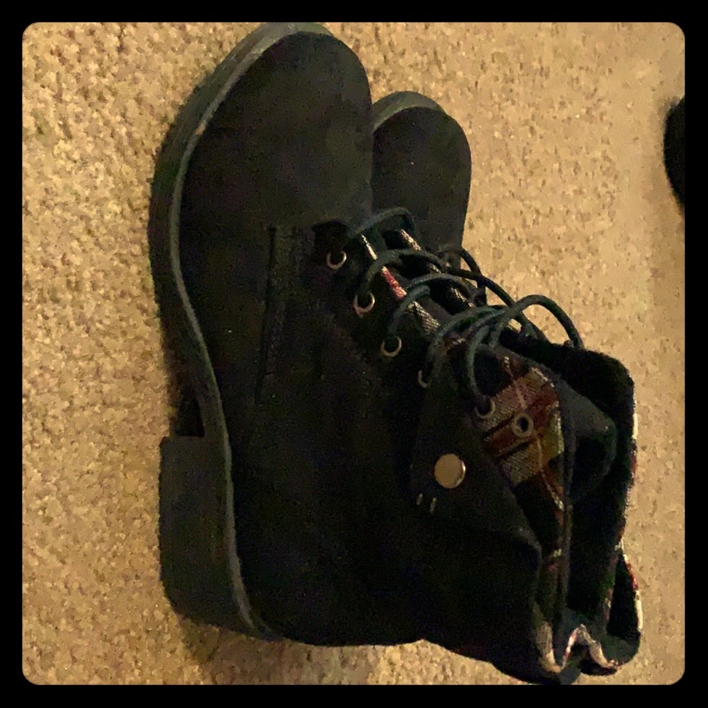 Worn one time boots with red plaid trim